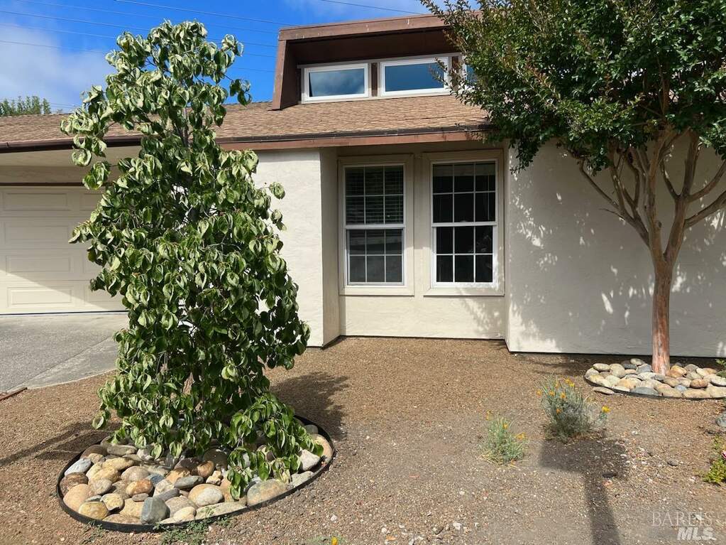 Easy care front yard and a private fenced backyard. at 1023 Damon Court, Santa Rosa, CA 95401