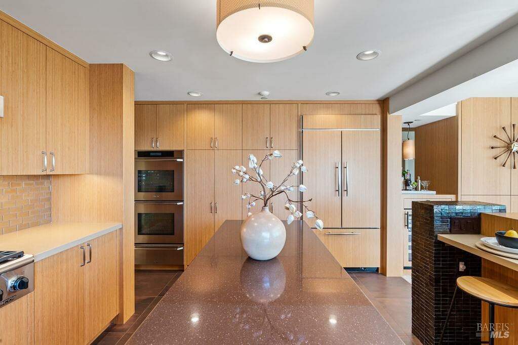 The custom bamboo cabinetry designed  by AlterECO of Sausalito provides an organic feel and eco-friendly choice.  Quartz countertops provide the finishing touch. at 95 Bulkley Avenue, Sausalito, CA 94965