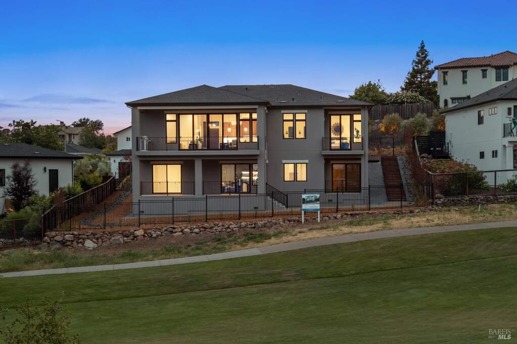 Here is the view of the rear of your new home as seen from the 1st fairway of the Fountaingrove Golf Course at sunset. at 3704 Llyn Glaslyn Place, Santa Rosa, CA 95403