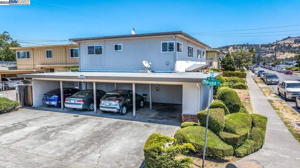 Carport with covered parking and storage for each unit at 1231 141st Ave, San Leandro, CA 94578