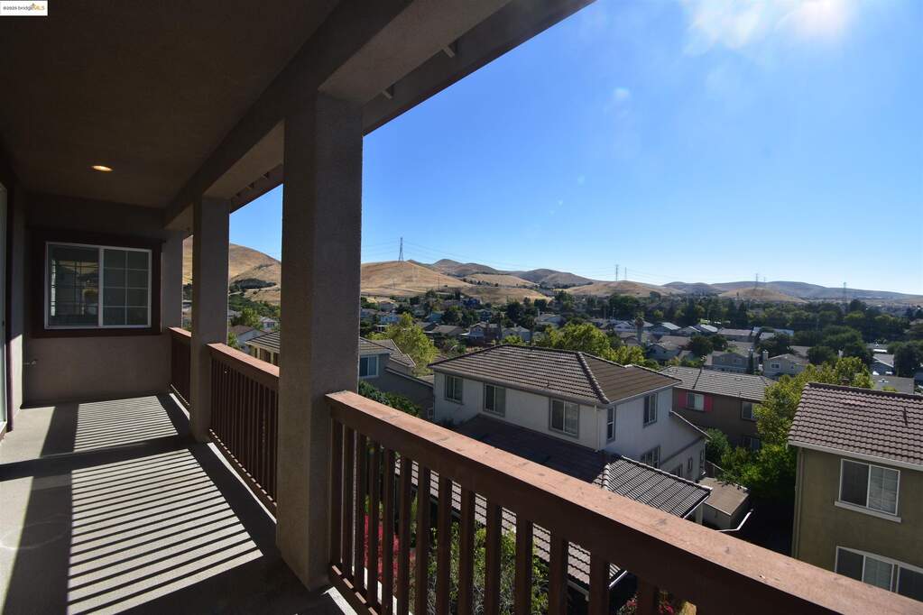 Balcony featuring a residential view and a mountain view at 127 Delta Vista Ln, Pittsburg, CA 94565