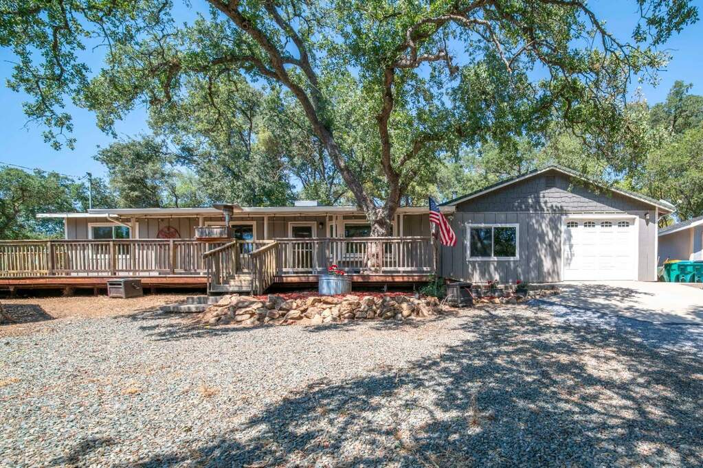 Front of home. Super clean with plenty of parking for vehicles, guests, and toys at 6221 Bird Song Lane, Placerville, CA 95667