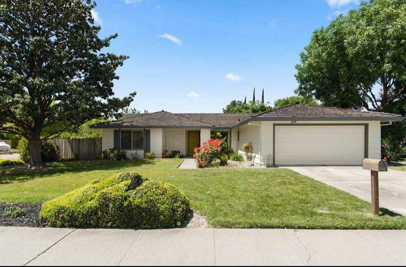 Old photo, property has composition roof at 7080 Greenhaven Drive, Sacramento, CA 95831