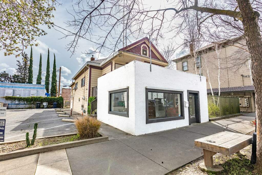 1423 28th Street is a mixed-use building that includes a 2bed/1bath residential unit upstairs, as well as a workshop and stand-alone retail building on the ground floor. This is a unique "live-work" opportunity in the heart of Midtown. at 1423 28th Street, Sacramento, CA 95816