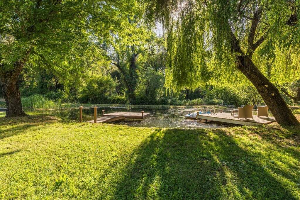 Private pond at 4980 Mountain View Drive, Lotus, CA 95651