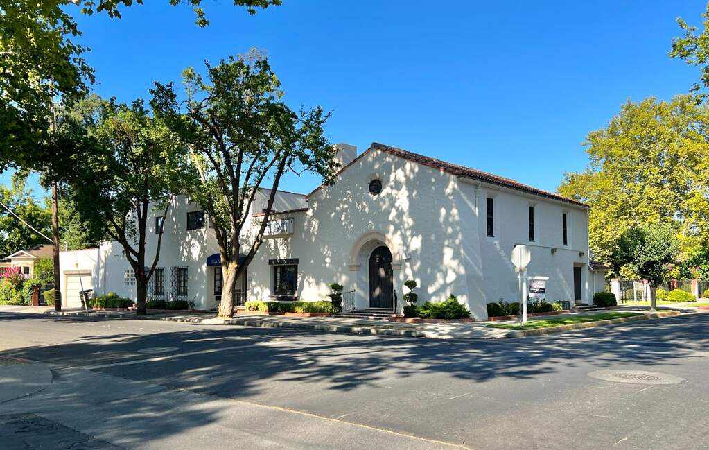 Great huge corner lot with plenty of paved parking areas, this custom built Motroni masterpiece offers 6000 sqft, including chapel, meeting rooms, offices, and a big upstairs apartment! Imagine the possibilities! Art center, music venue, parties and weddi at 175 Second Street, Woodland, CA 95695