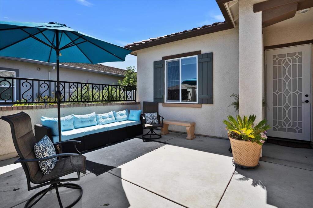 Relax on your front patio in the evening with a glass of wine! at 4466 Ligurian Sea Lane, Sacramento, CA 95834