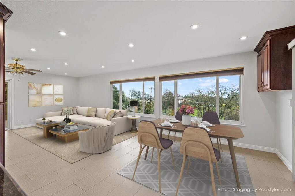 Family room off kitchen with views of Effie Yaw nature area and has access to the front balcony and back yard circular porch overlooking the pool at 3006 Scenic Heights Way, Carmichael, CA 95608