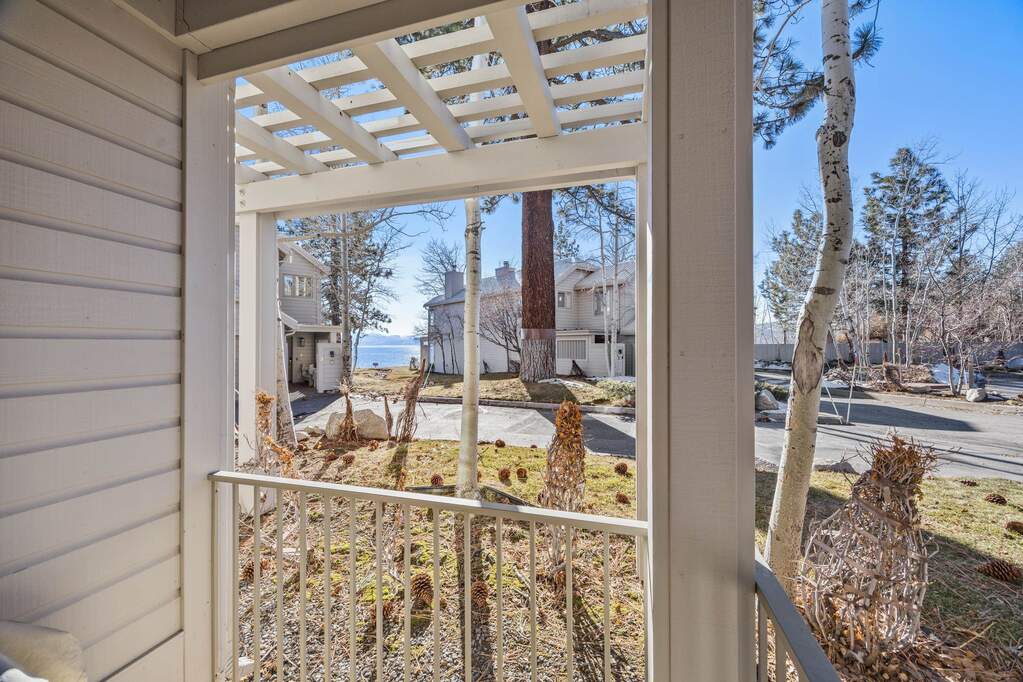Step outside your sliding door off the dining area onto your private deck with a Lake Tahoe view. at 8004 North Lake Garden Boulevard #GARDEN UNIT 2, Kings Beach, CA 89502